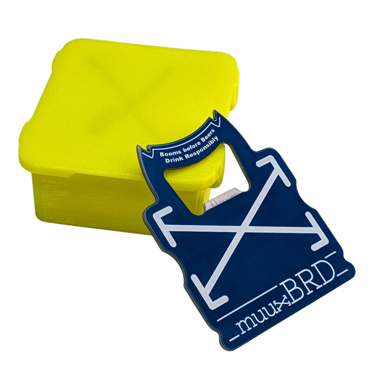 muuxBRD Bottle Opener leaning against a slat enclosure