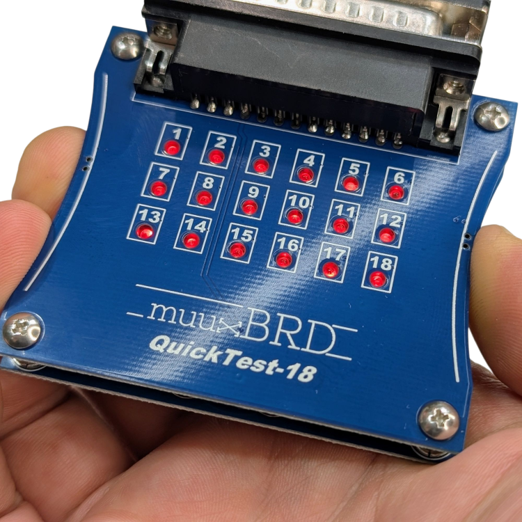 Holding a QuickTest-18 ematch tester for use with your Cobra slats.