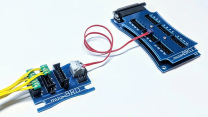 A Mongoose slat connected to a QuickSplit-12 series breakout board with several MJG ematches wired in series 