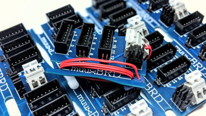A pile of QuickSplit-12 breakout boards