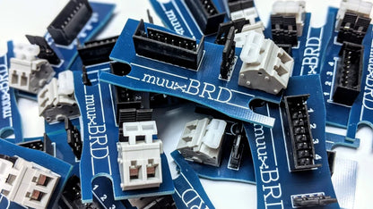 A pile of QuickSplit-4 series breakout boards.