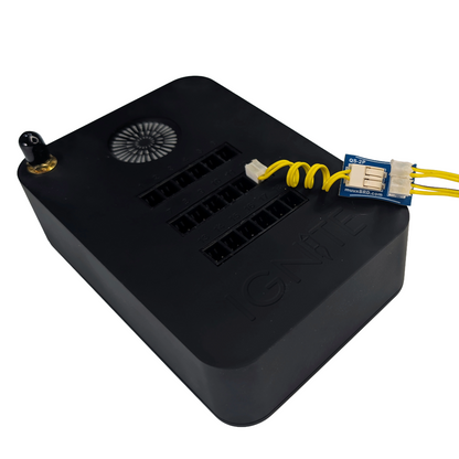 QuickSplit-2P connected to an IGNITE firing system, and two QuickPlug ematches.