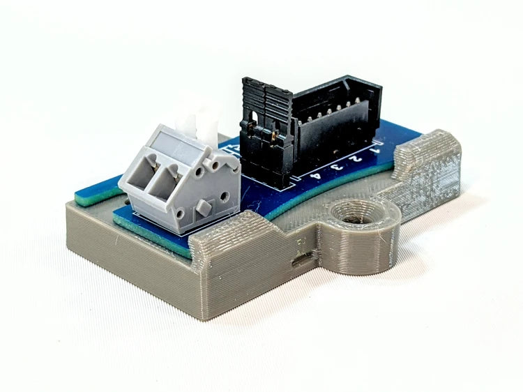 QuickSplit-4 series breakout board on a protective mounting base.