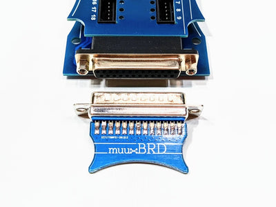 DB25 shunt about to be plugged into a QuickPlug slat