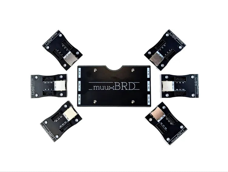 Top down view of the RJ-3P breakout board for the IGNITE i18 and six 6-cue QuickPlug slats.