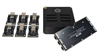 RJ-36i RJ45 breakout board next to a IGNITE i36 and six 6-cue QuickPlug slats