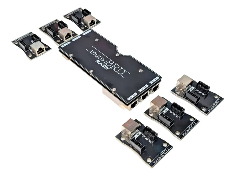 RJ-36i RJ45 breakout board surrounded by six 6-cue slats