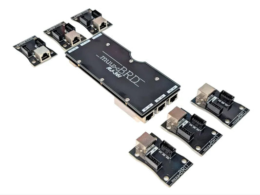 RJ-36i RJ45 breakout board surrounded by six 6-cue slats