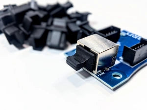 RJ45 port protector installed the RJ45 port of a QC-6 QuickConnect-6 slat QC-6