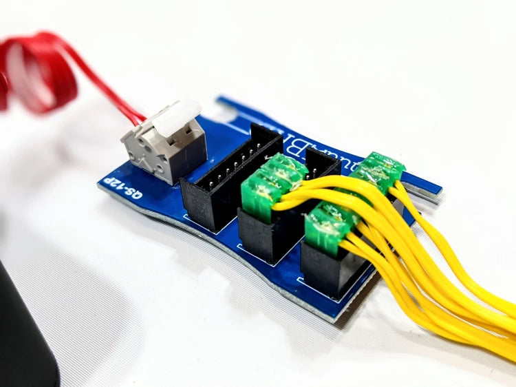 QS-12P breakout board, and several MJG ematches wired in parallel