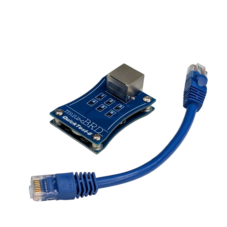 QT-6 along side a short CAT5 cable for connecting your 6-cue slats